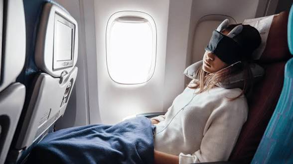 Ways to Sleep Better on Long Flights